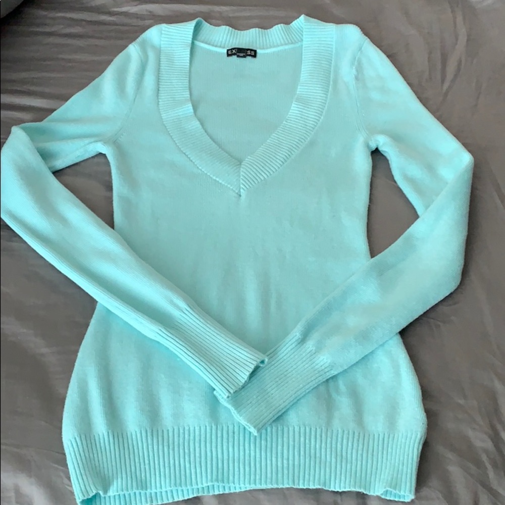 Teal sweater with a deep v-neck